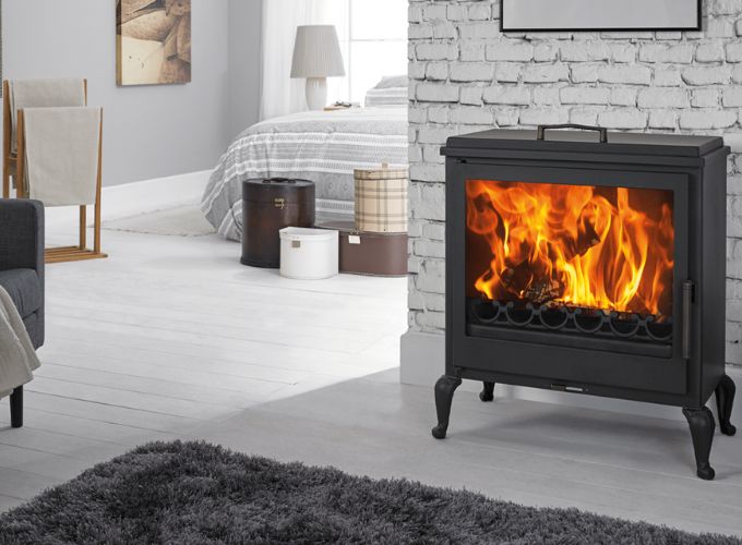 Placing a classic wood stove in the bedroom