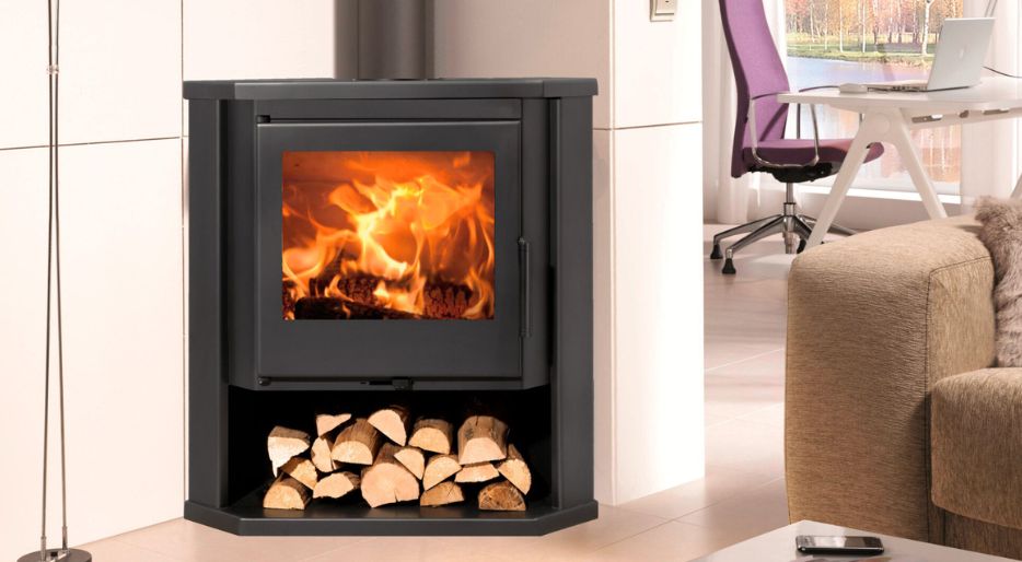 The best way to make the most of space: corner stoves and fireplaces