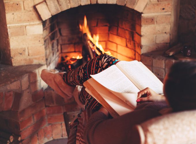 An afternoon of reading by the wood-burning fireplace